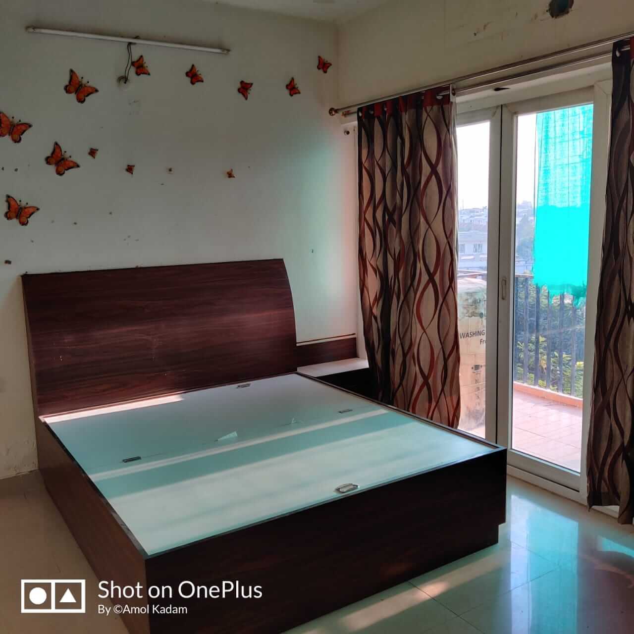 Semi furnished two bhk with study room flat for rent in gated community