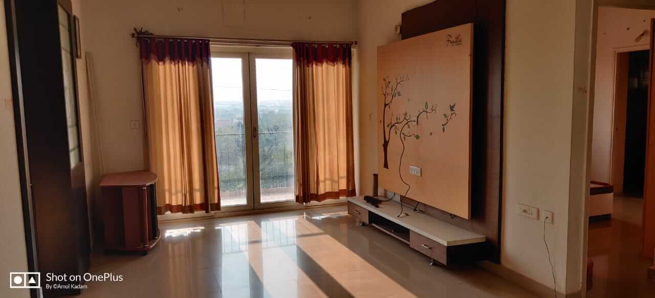 Semi furnished two bhk with study room flat for rent in gated community